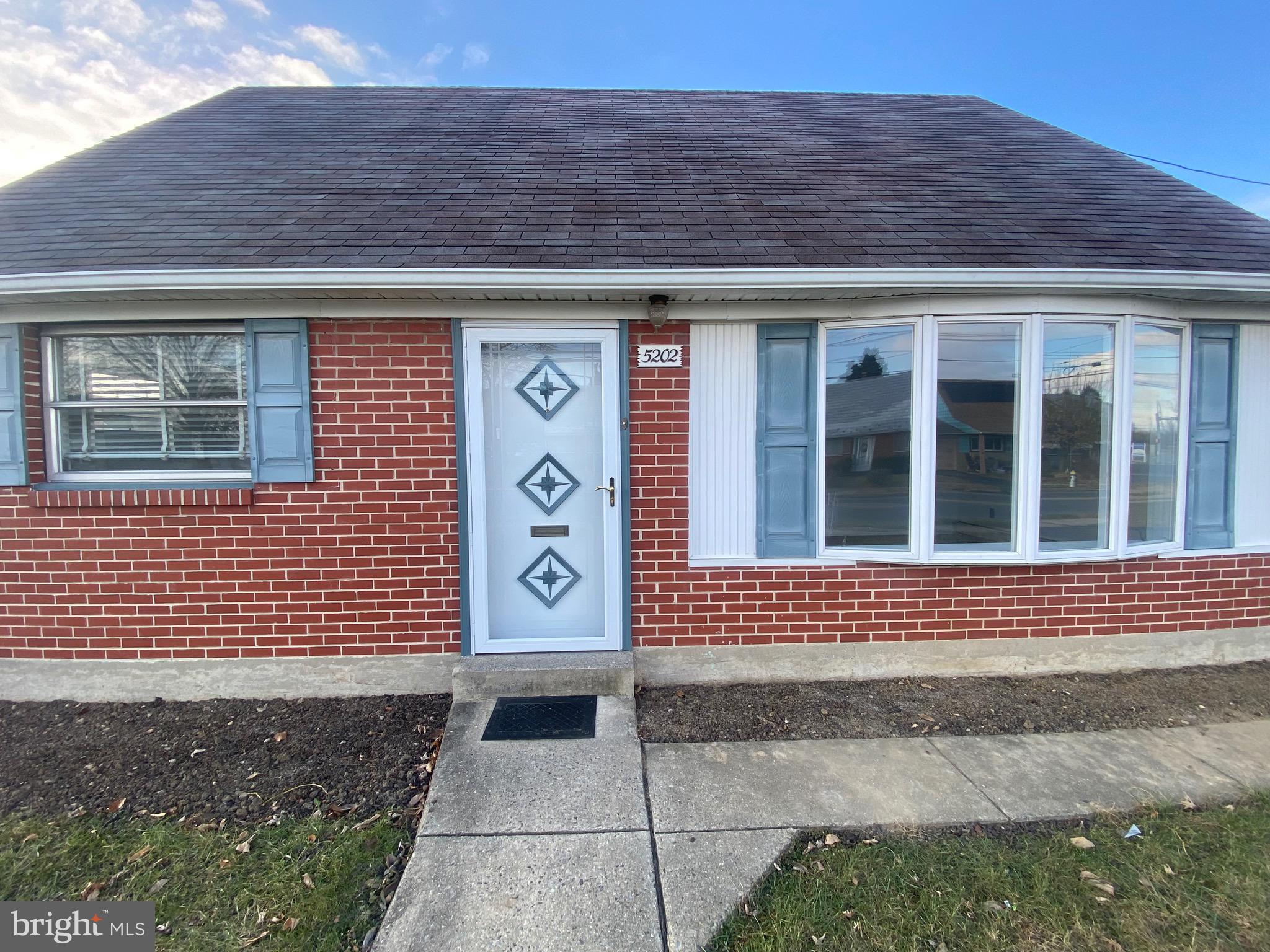 a front view of a house with a door