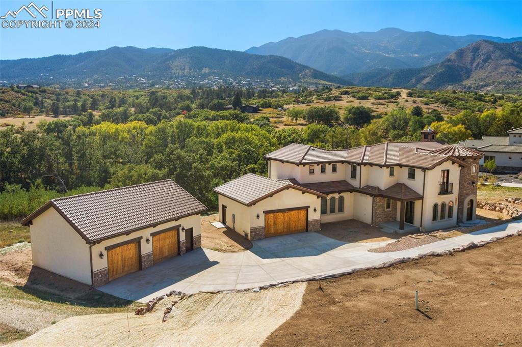 a view of a house with a mountain