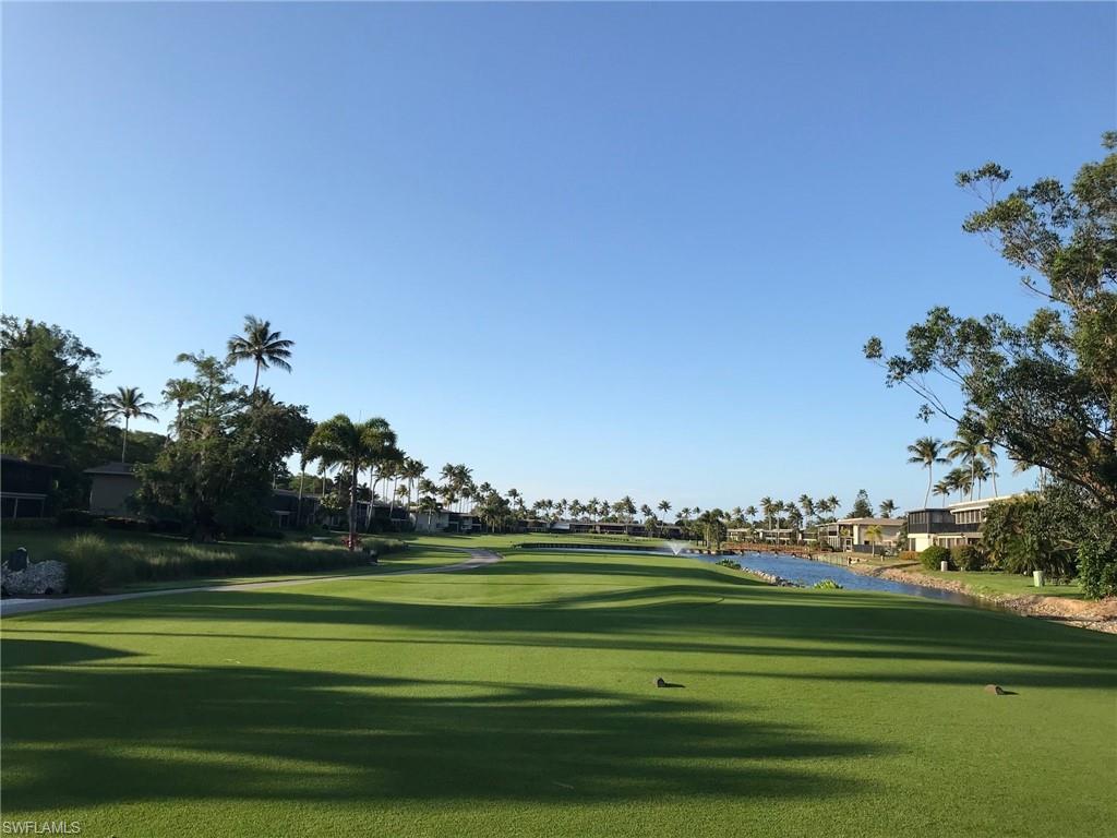 View of property's community featuring a lawn