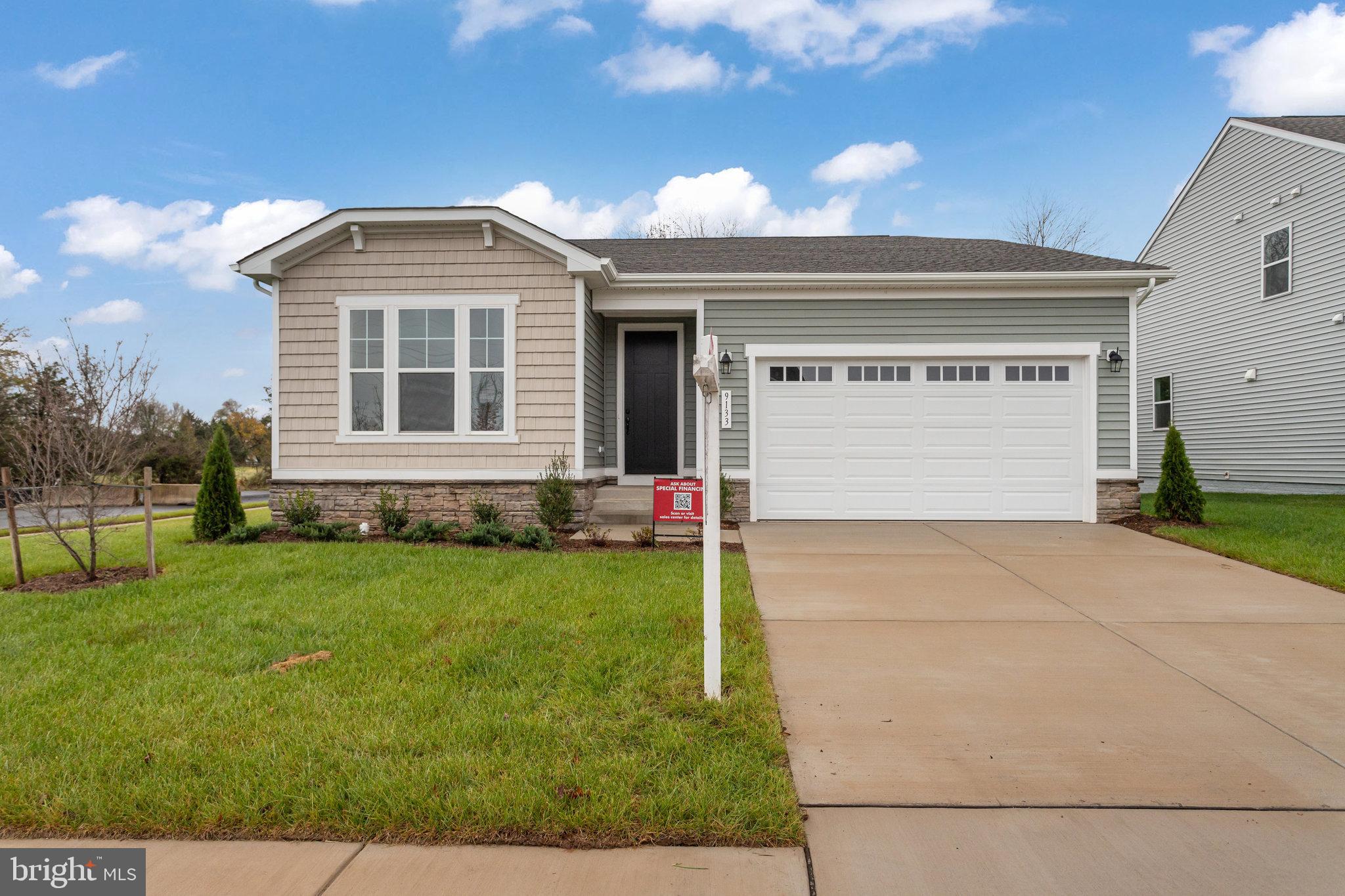 a front view of house with yard