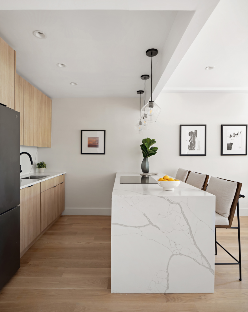 a living room with a sink furniture and a window