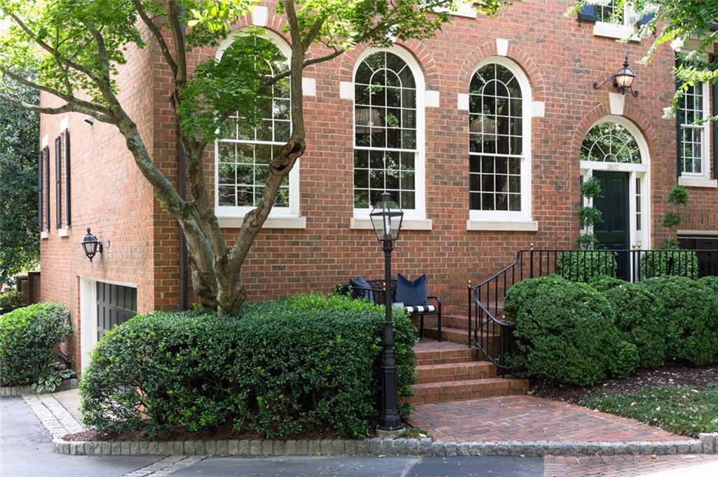 front view of house with a garden