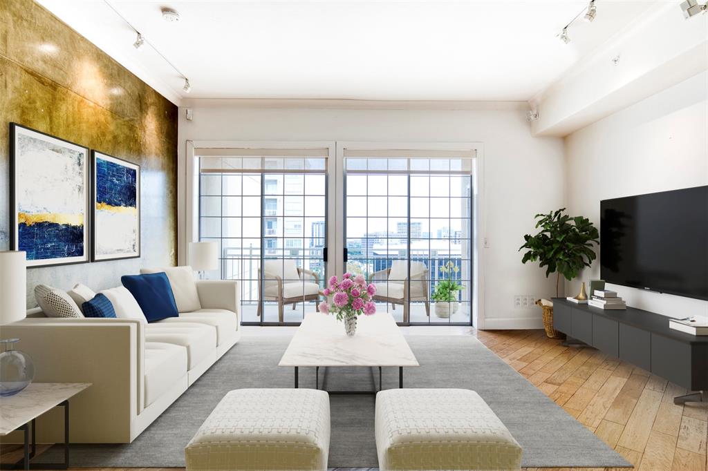 a living room with furniture and a flat screen tv