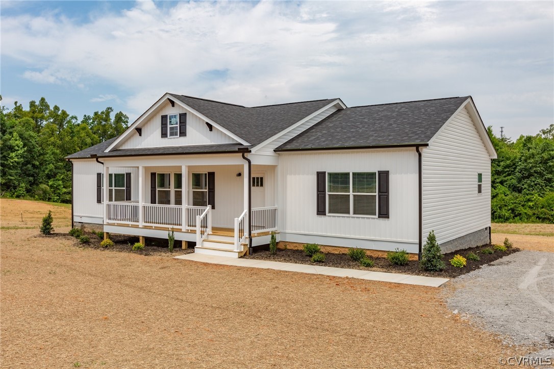 an front view of a house with a yard