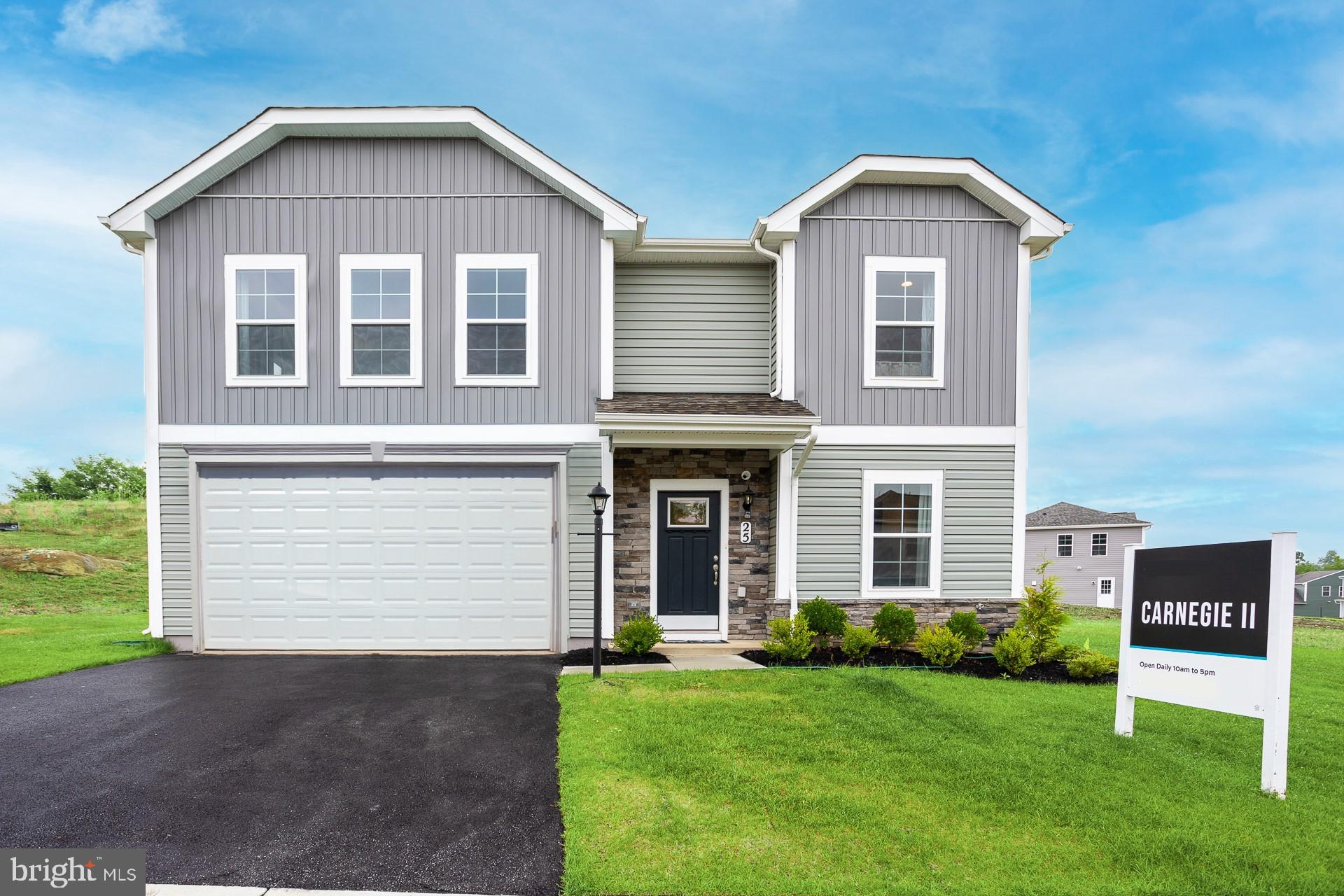 a front of a house with a yard