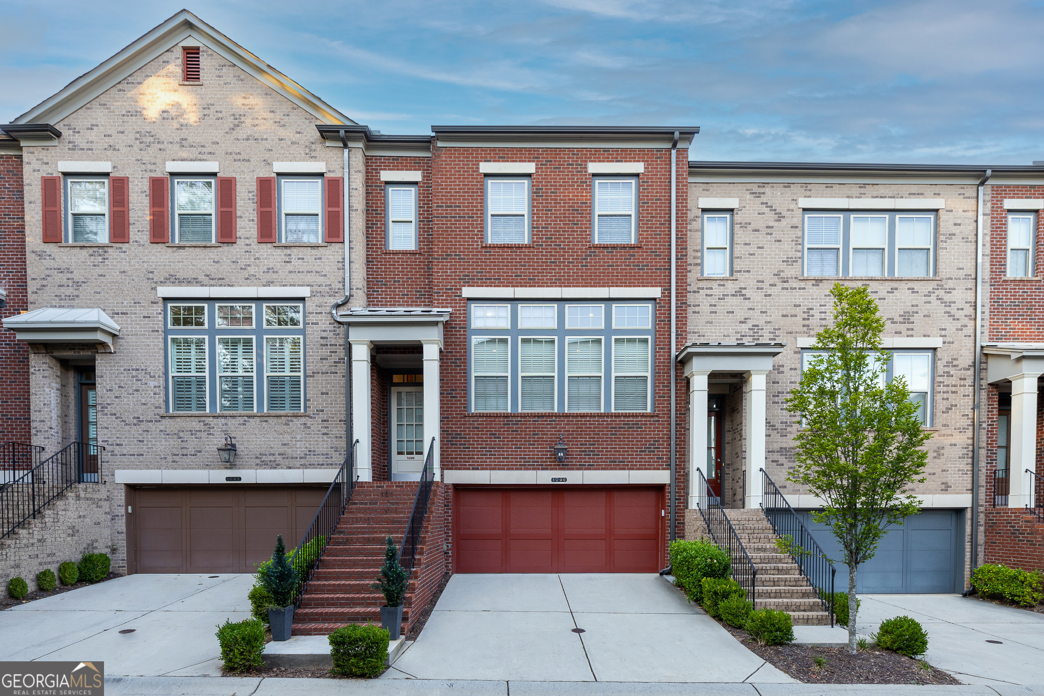 Welcome to 1096 Holly Ave! 3 level townhome in a gated community with a pool.