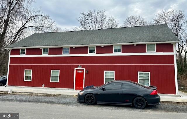 a car parked in front of a house