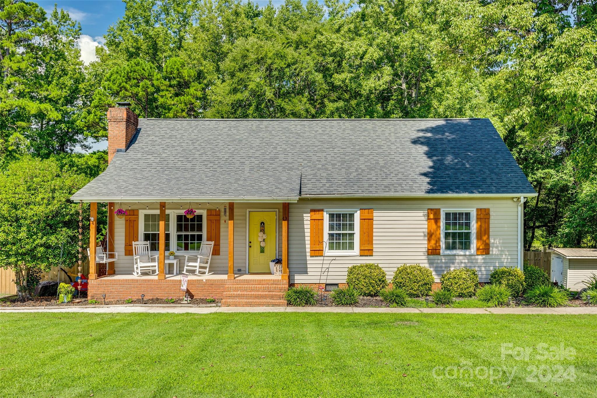 front view of a house with a yard