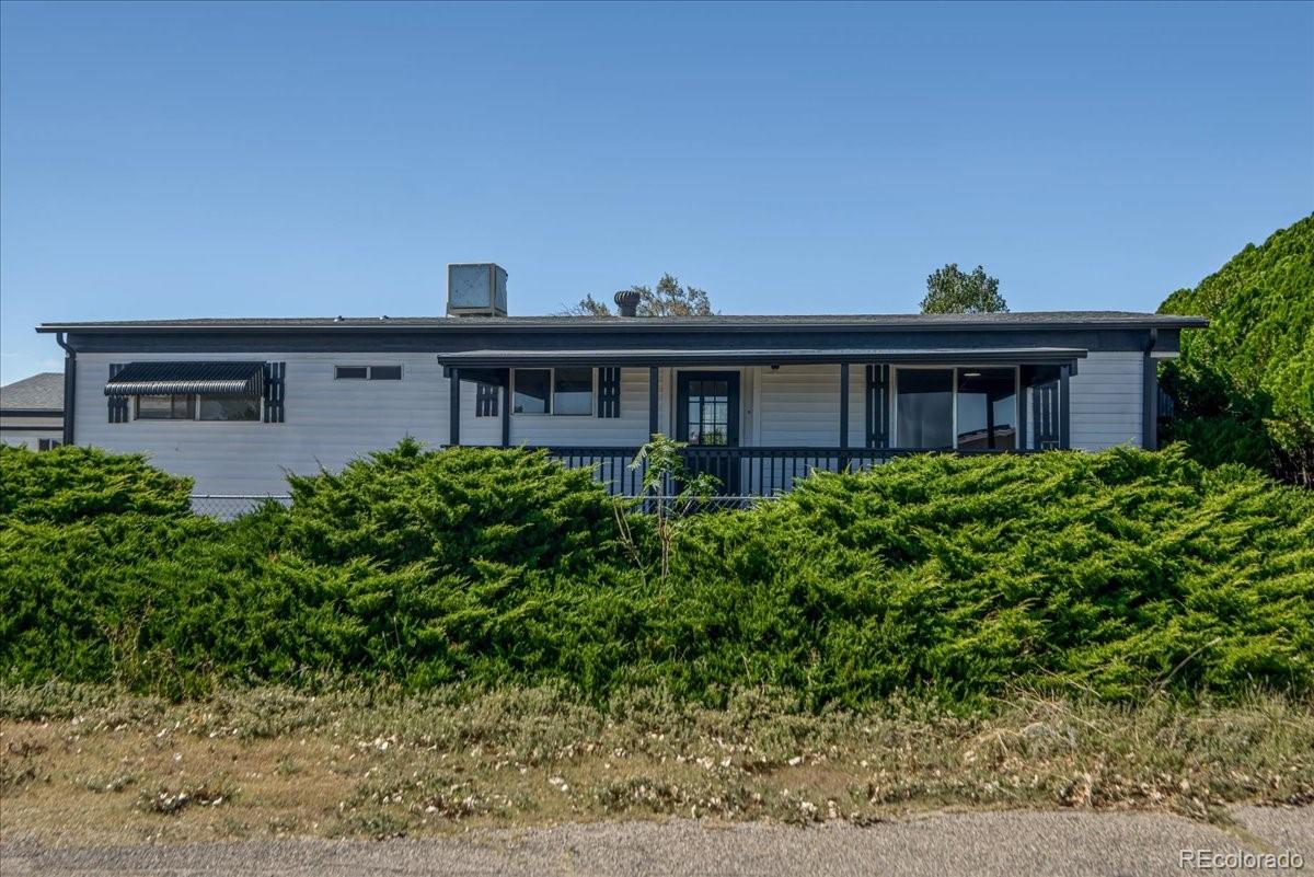 front view of house with a yard