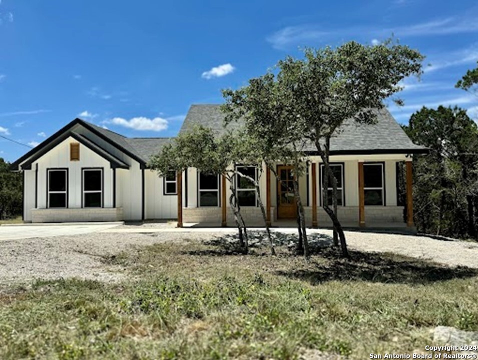 a house with yard in front of it