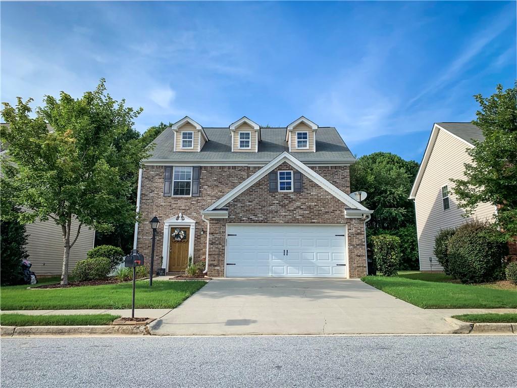 Brick front with easy driveway