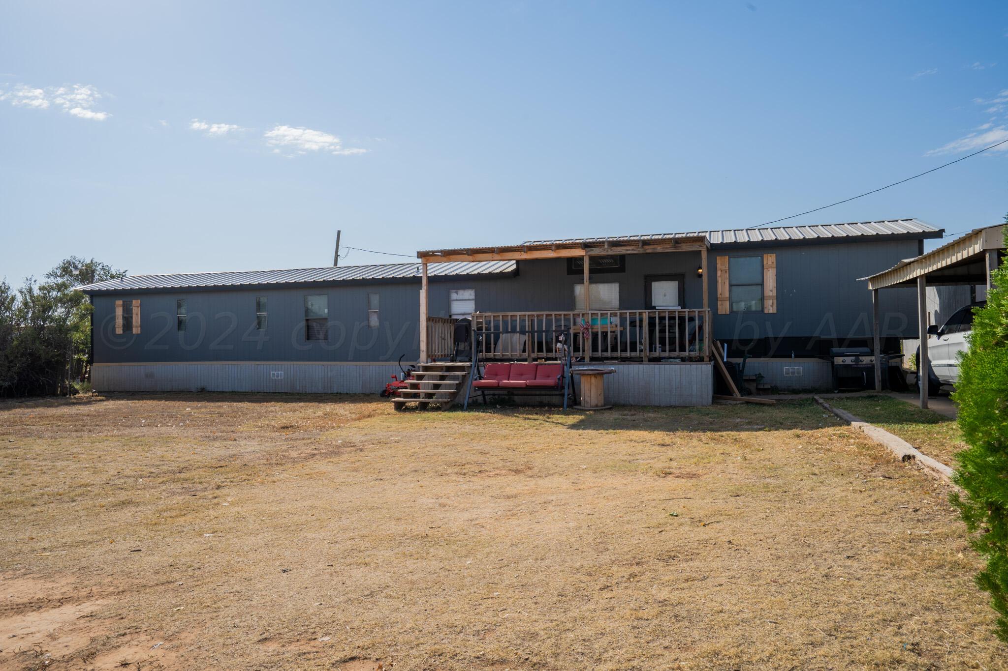 a view of house with outdoor space