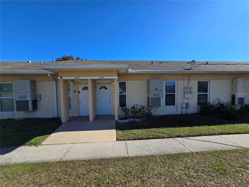 front view of house with a yard