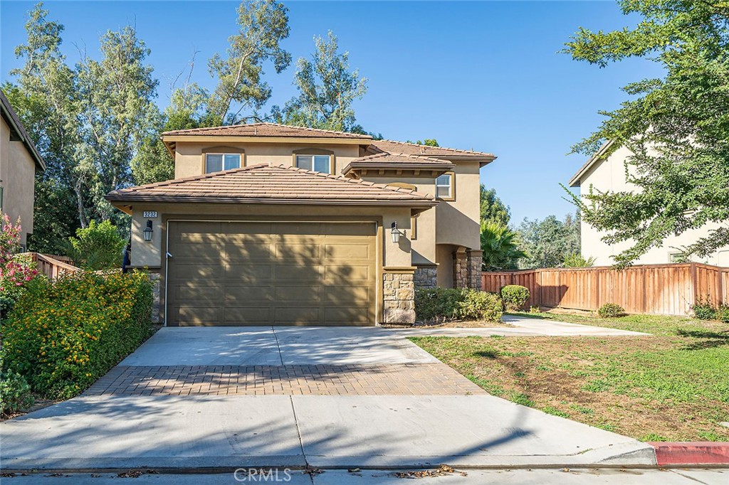 Front View with garage and driveway