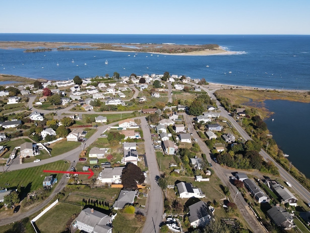 an aerial view of beach and ocean