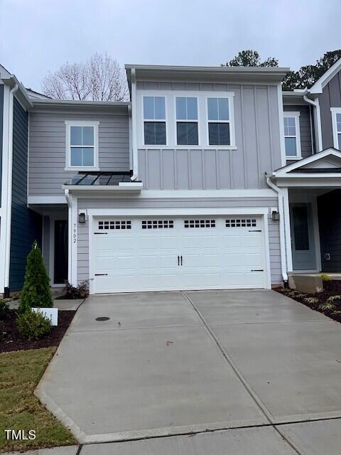 a view of a house with a garage