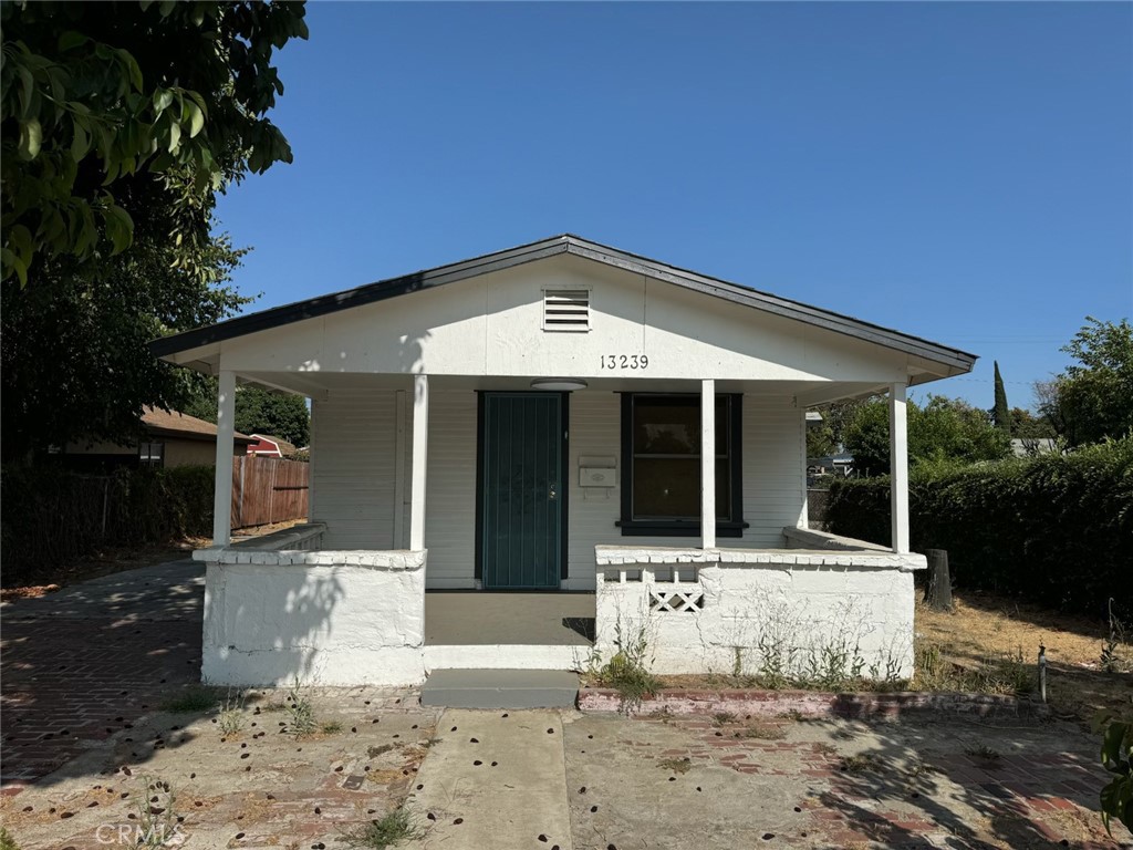 a front view of a house with a porch