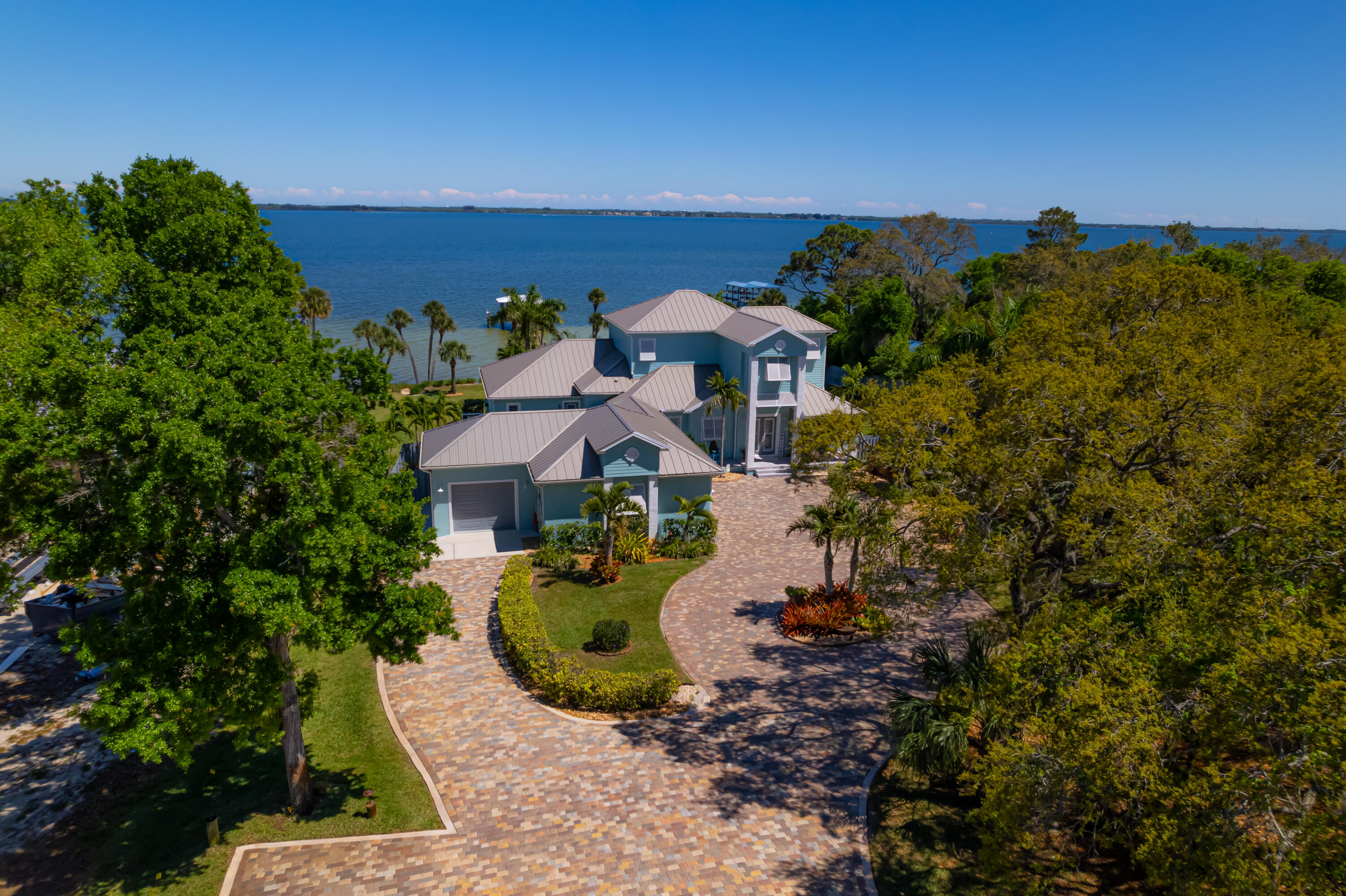 an aerial view of a house with a garden