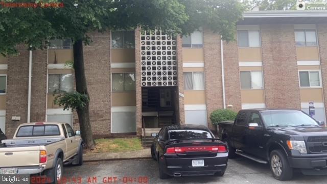 a car parked in front of a house