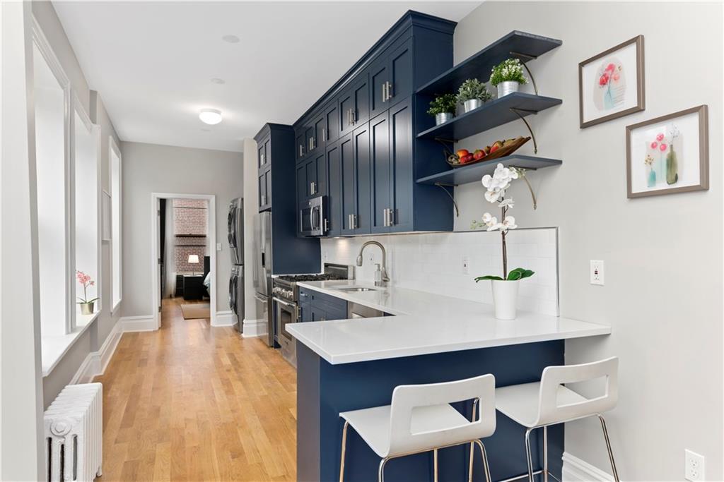 a view of kitchen island table and chairs