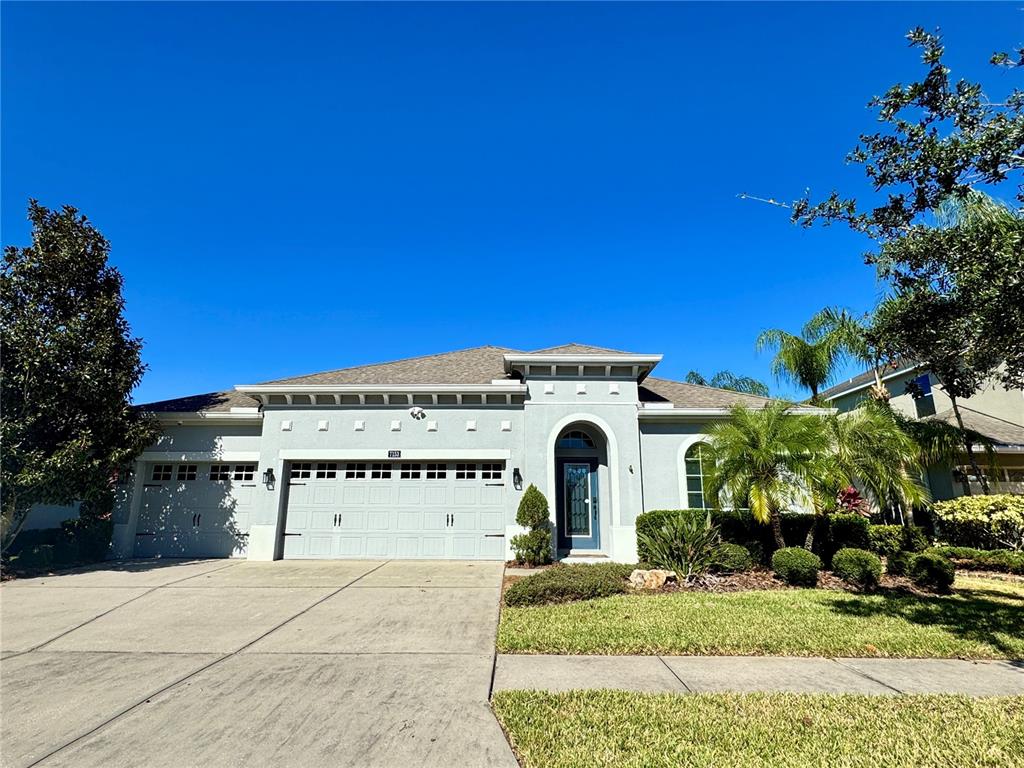 a view of a house with a garage