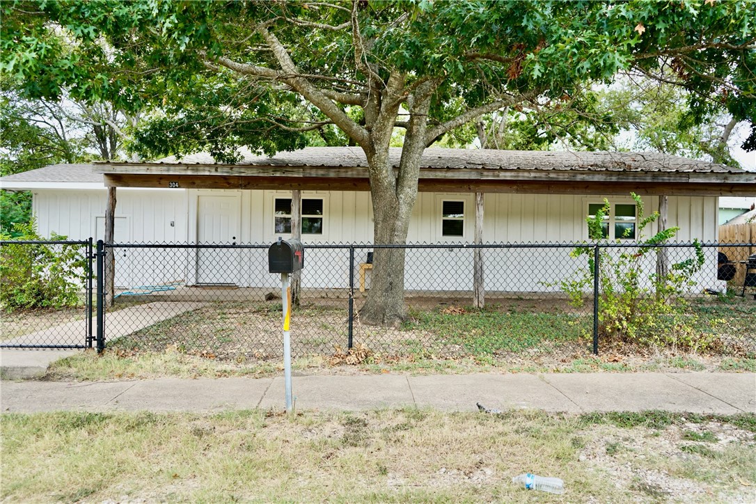 a house view with a yard