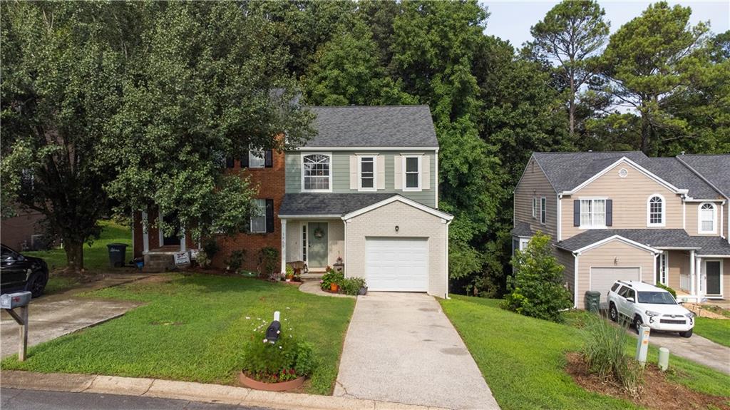 front view of a house with a yard