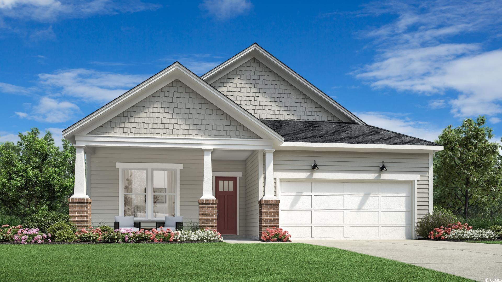 Craftsman-style home featuring a garage and a fron