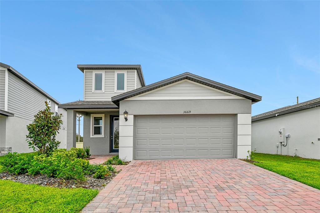 a front view of house with yard