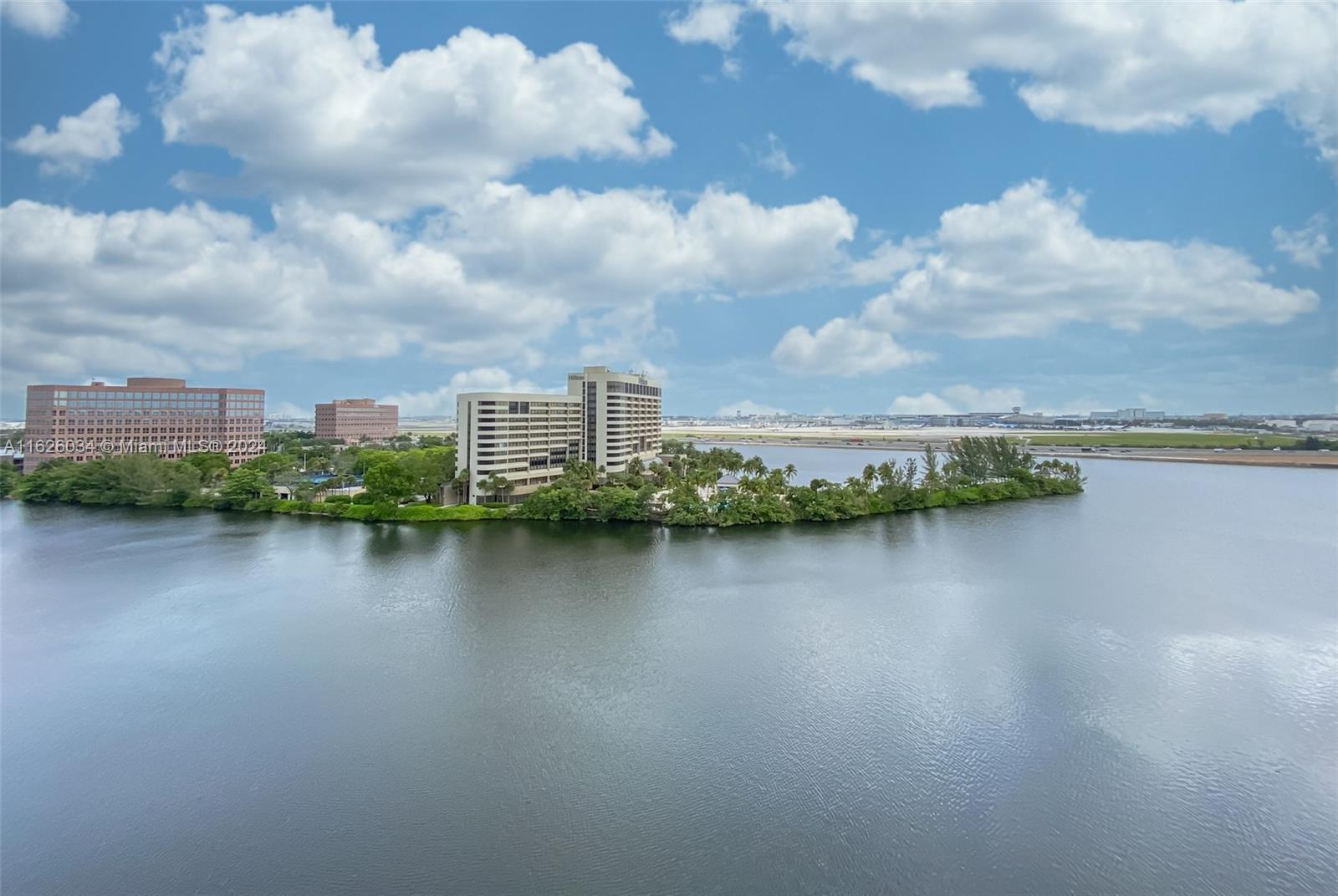 a view of a city with a lake