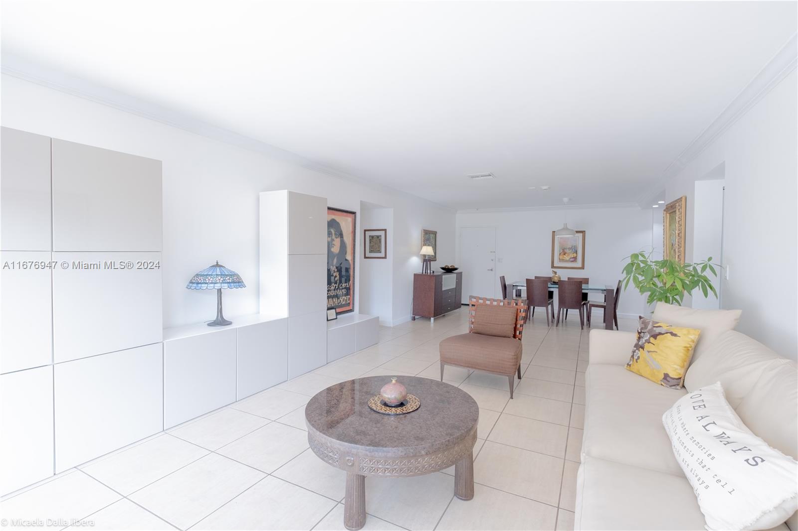 a living room with furniture and a table