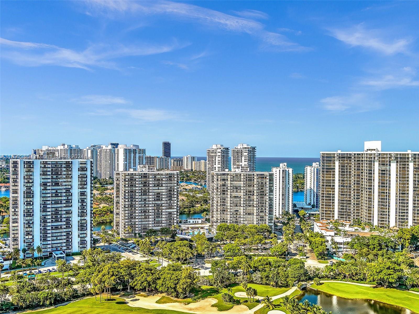 a view of city with tall buildings