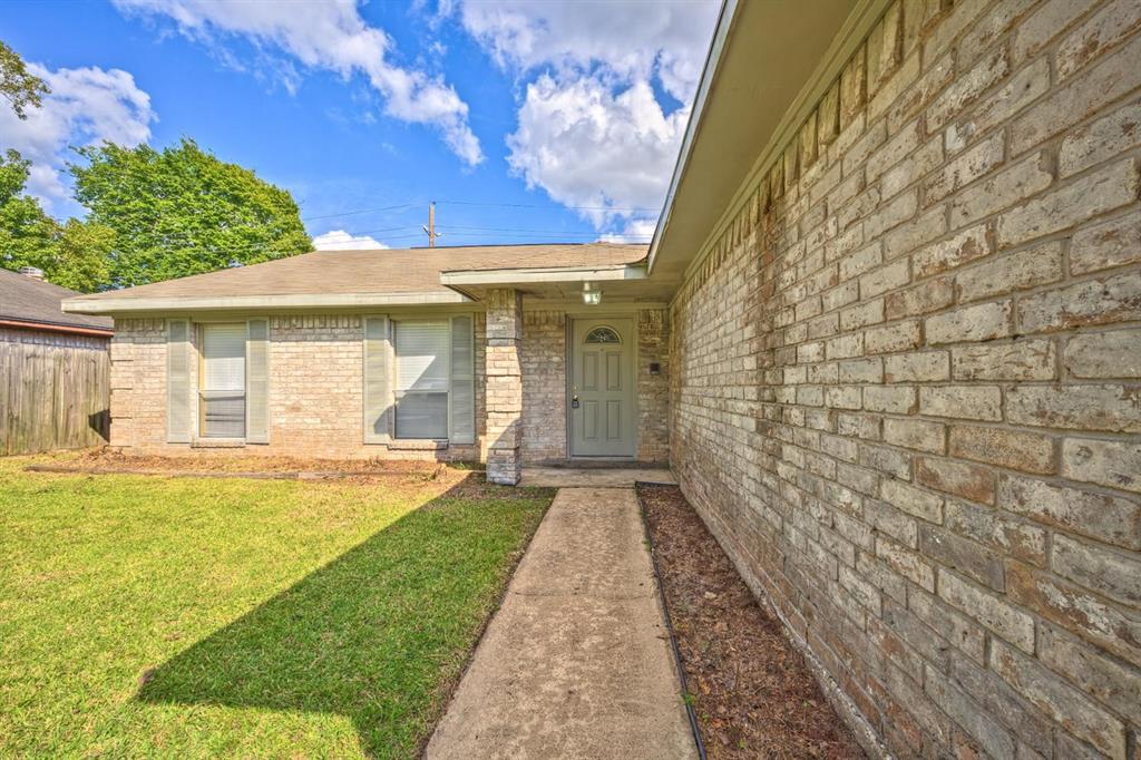 a front view of a house with yard