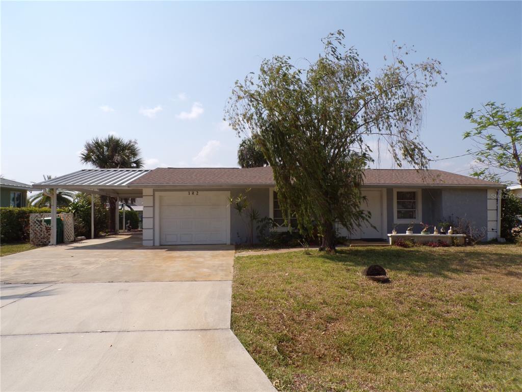 a front view of house with yard