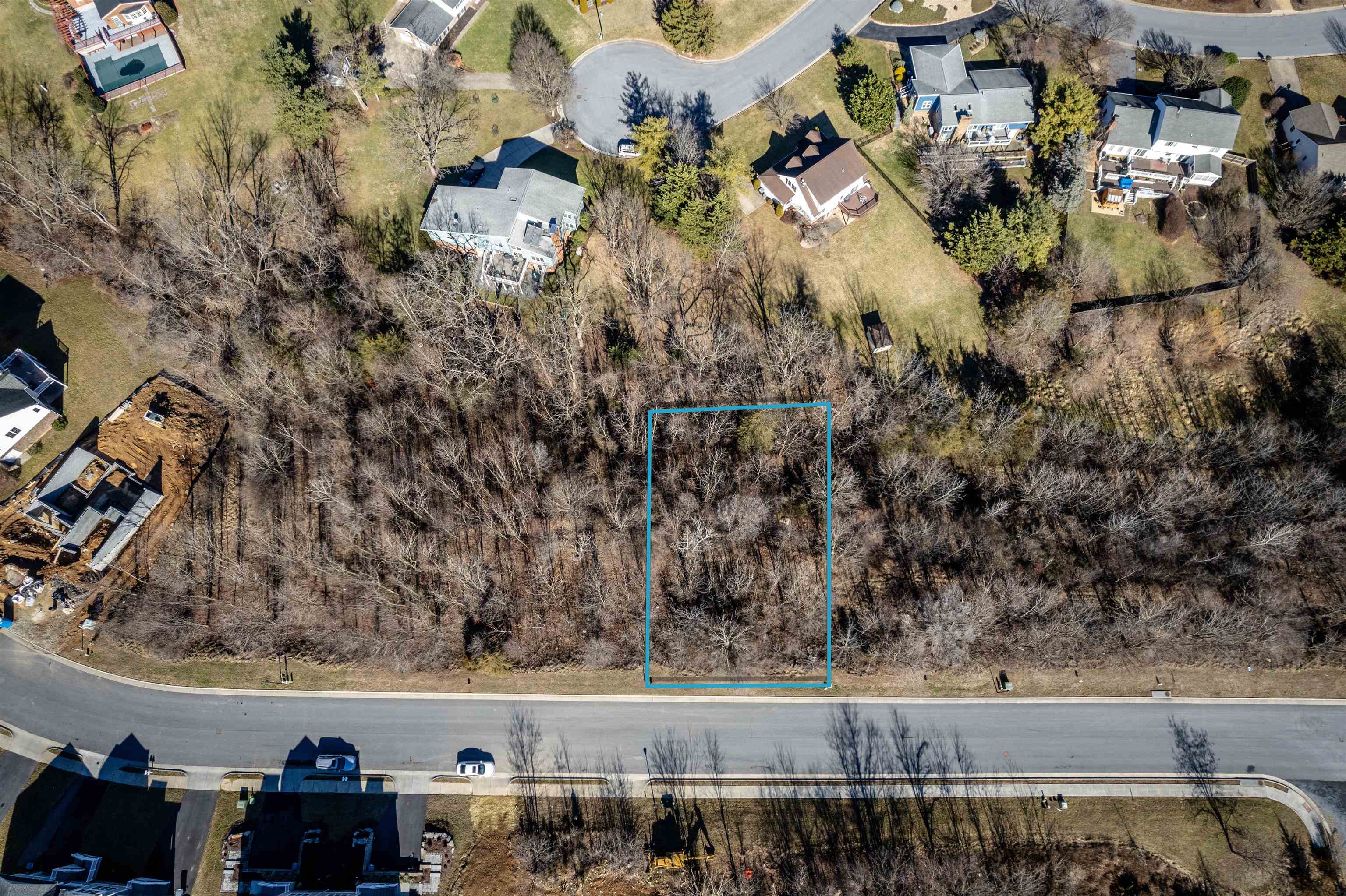 an aerial view of a house with outdoor space