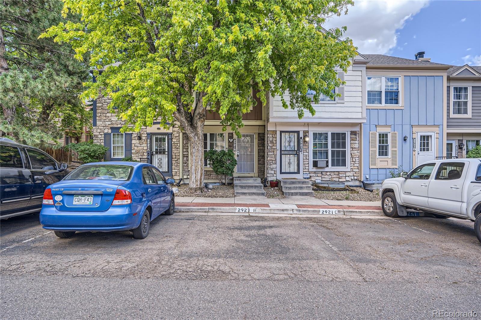 a car parked in front of a house