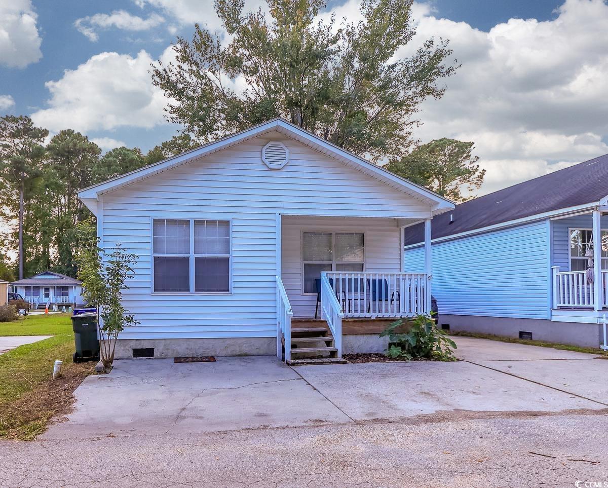 View of front of home with covered porch