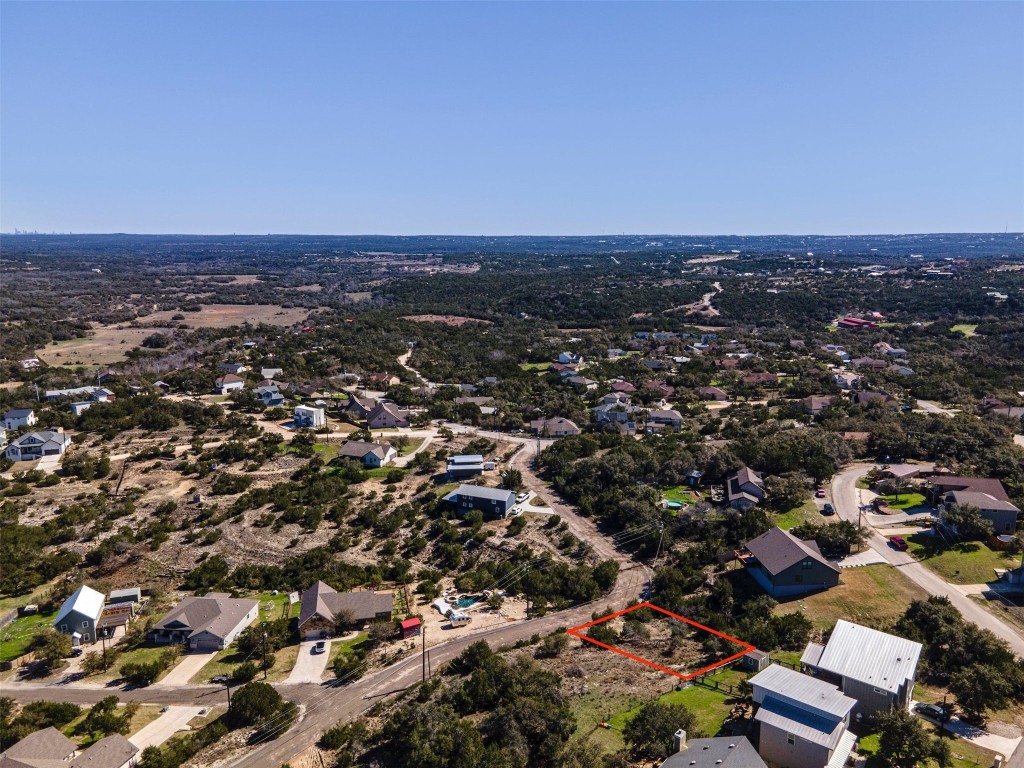 an aerial view of a city with lots of residential buildings