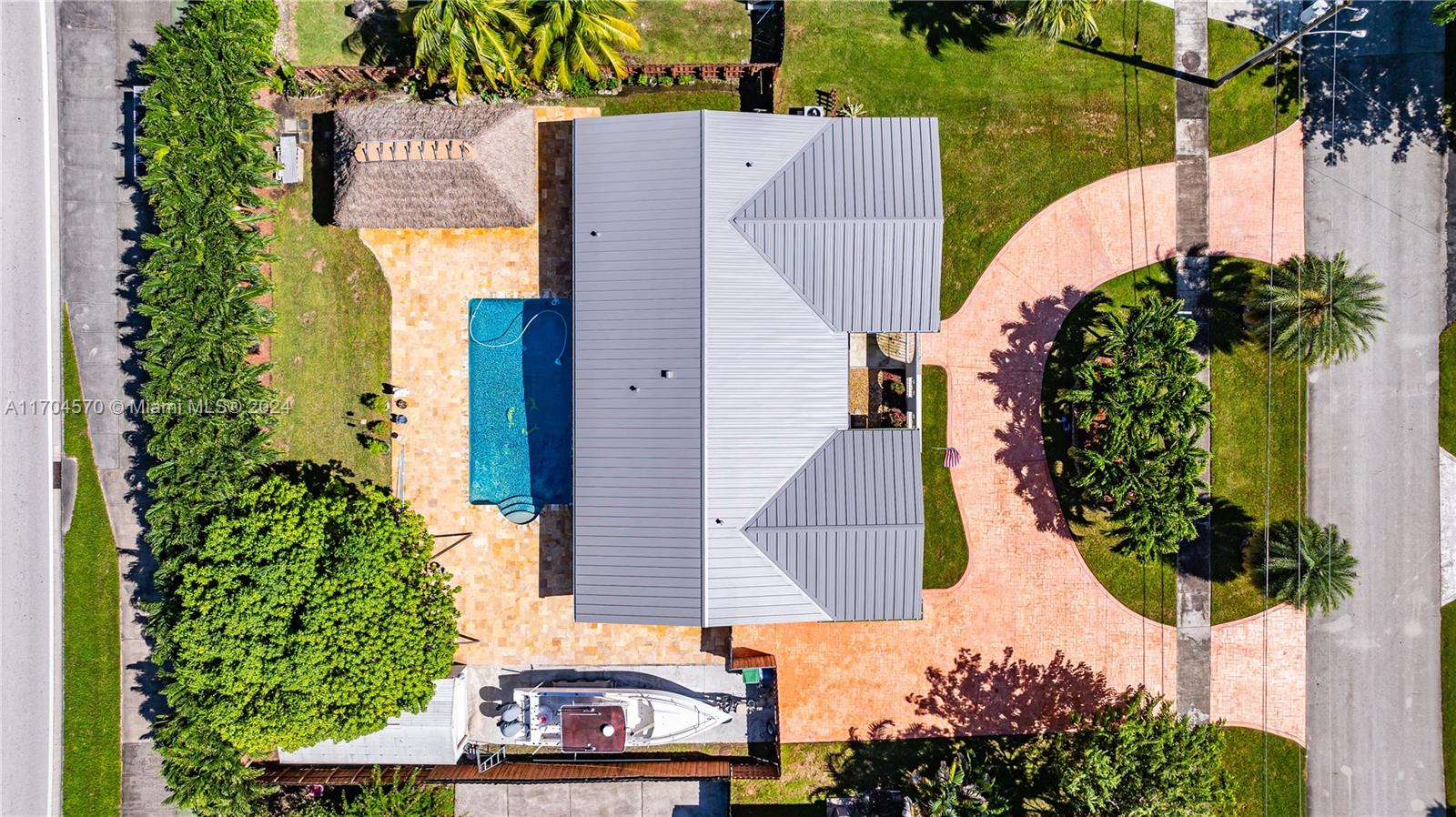 an aerial view of a house with a garden