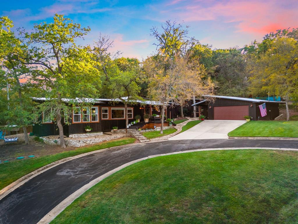 a view of yard with green space and porch