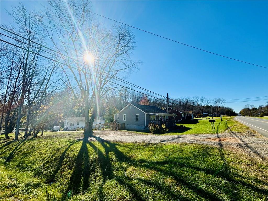 Two homes, one property! 1699 W Pine St (front, gray home on right); 518 Toast (white home on left)