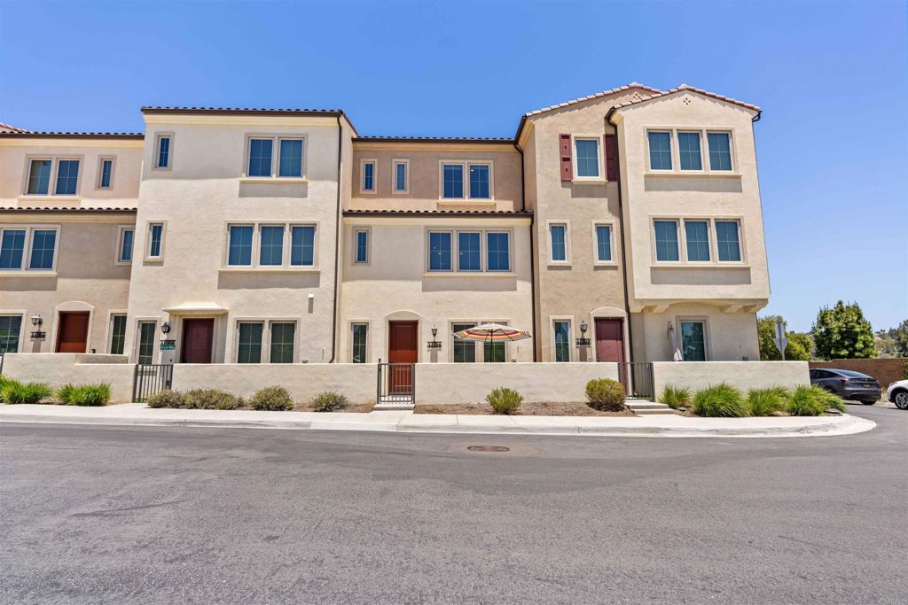 a front view of multi story residential apartment building