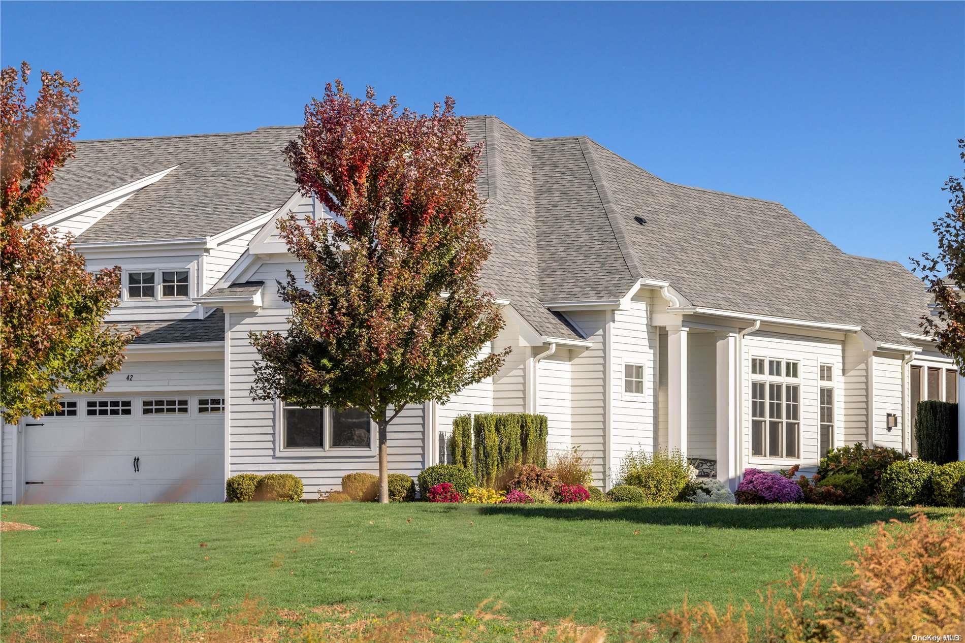 a front view of house with yard