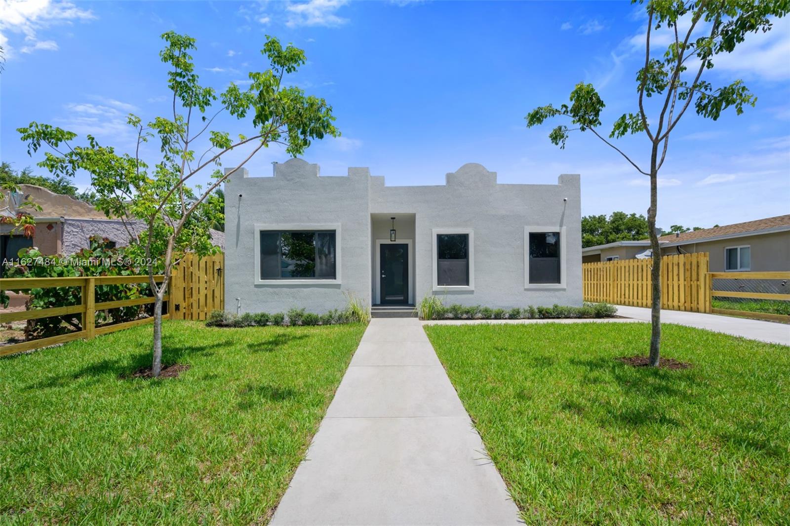 a front view of house with yard