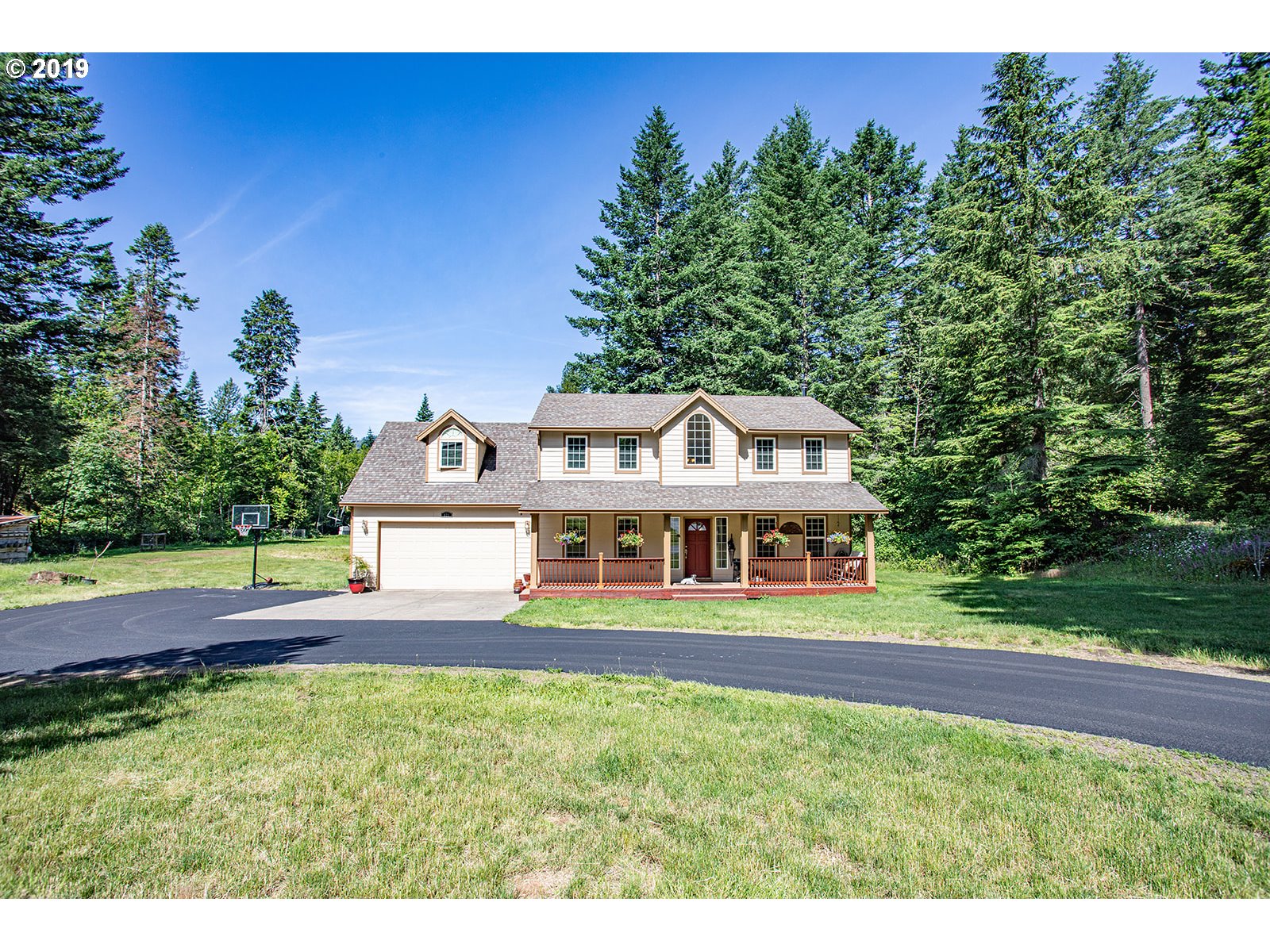 a view of a house with a big yard