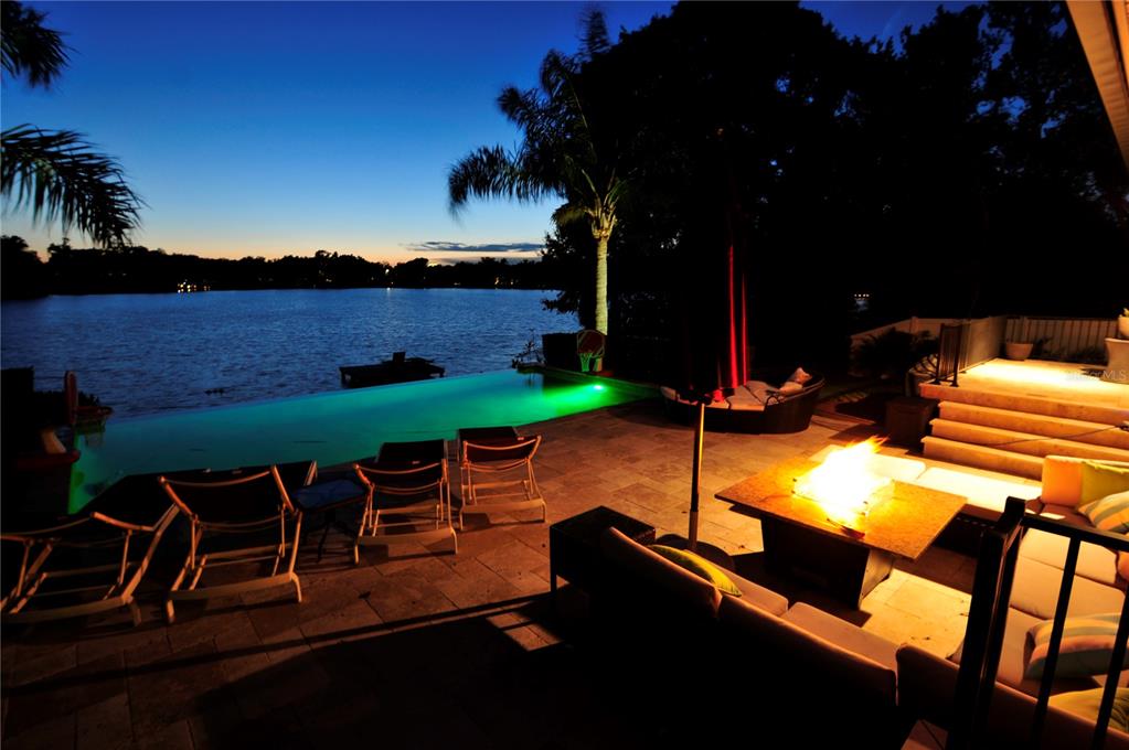 a view of a chairs and table in patio