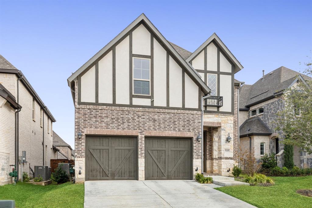 a front view of a house with yard