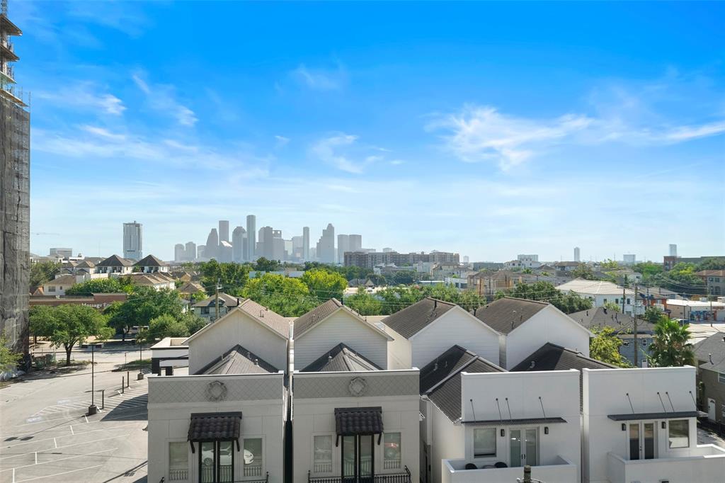 a view of a city with a building in the background