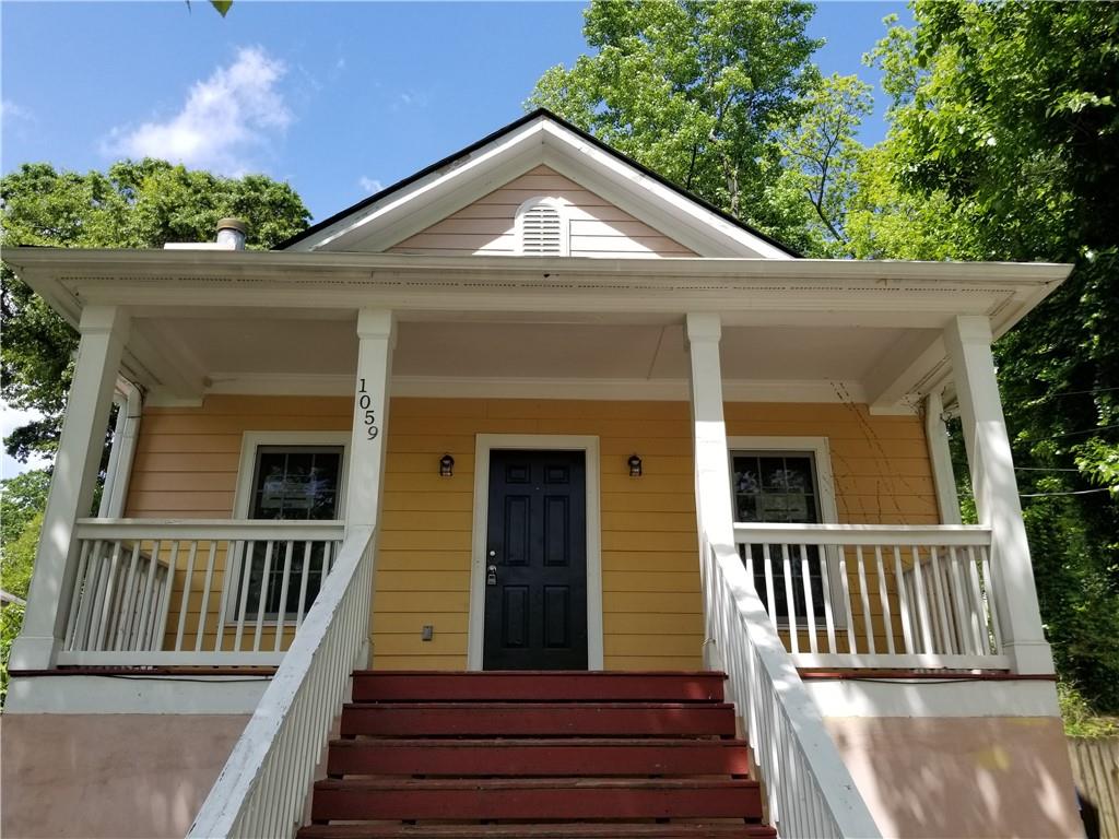 a front view of a house having yard