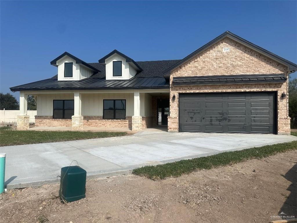 View of front of house featuring a garage